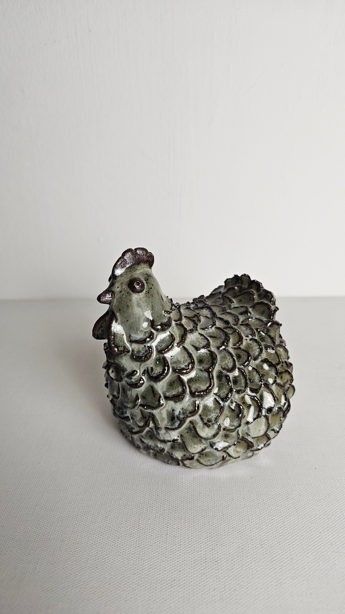 Chicken Peck Figurine