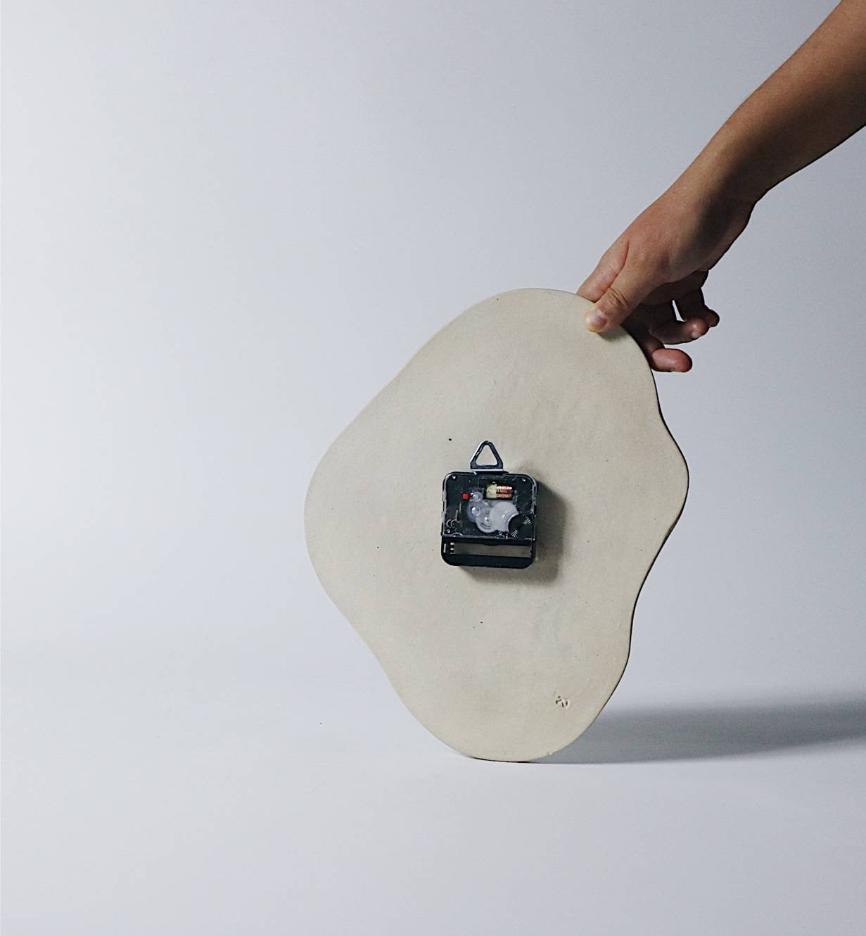 Sculptor Ceramic Clock